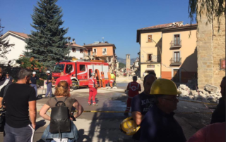 First responders and citizens collaborating on the scene of a disaster